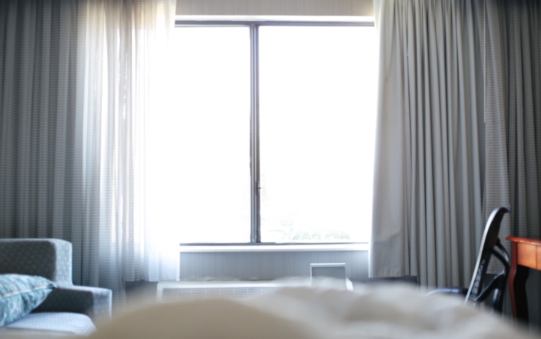 services-02 white-bed-near-white-window-curtain-gszclvkr4ok